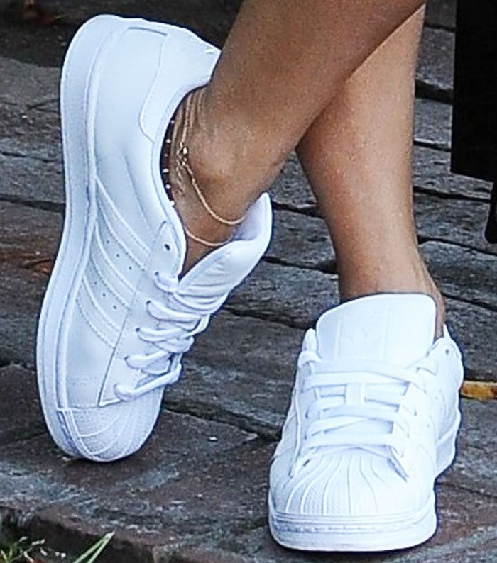 Vanessa Hudgens's feet in white Adidas sneakers