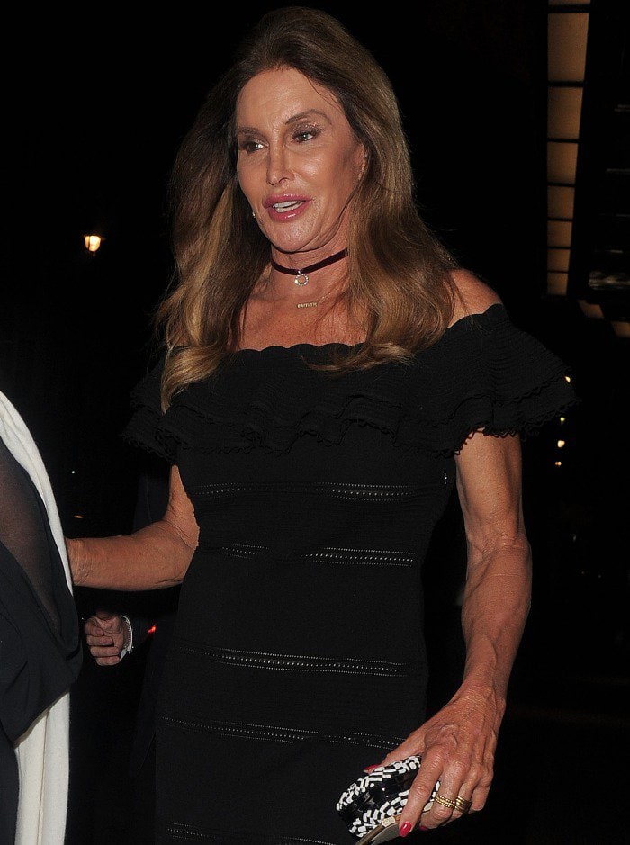 Caitlyn Jenner styled her off-the-shoulder dress with a geometric patterned clutch