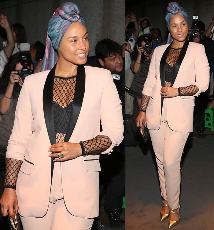 Alicia Keys flashed a hint of cleavage and abs in Tom Ford blush suit