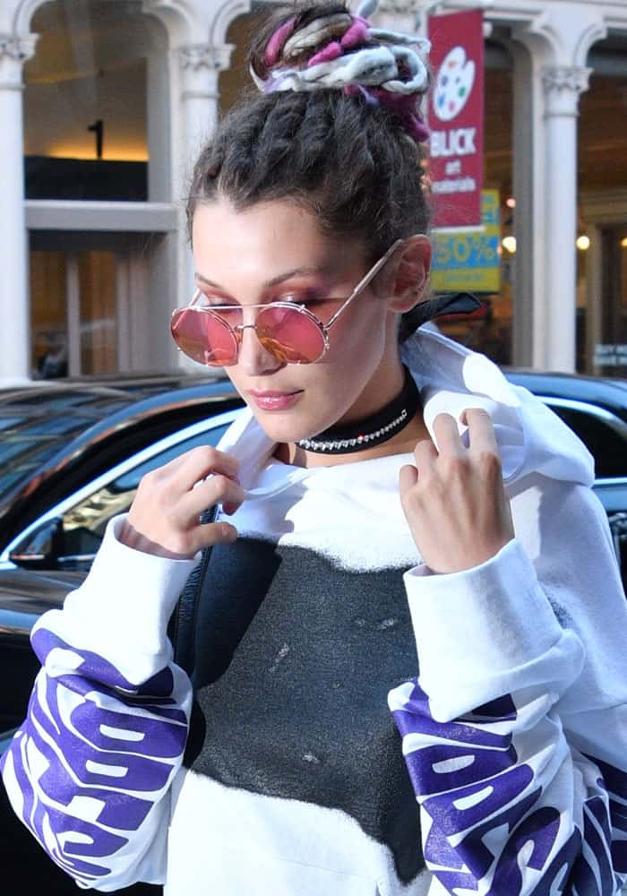 Bella Hadid wears a cozy oversized sweater outside her New York City apartment
