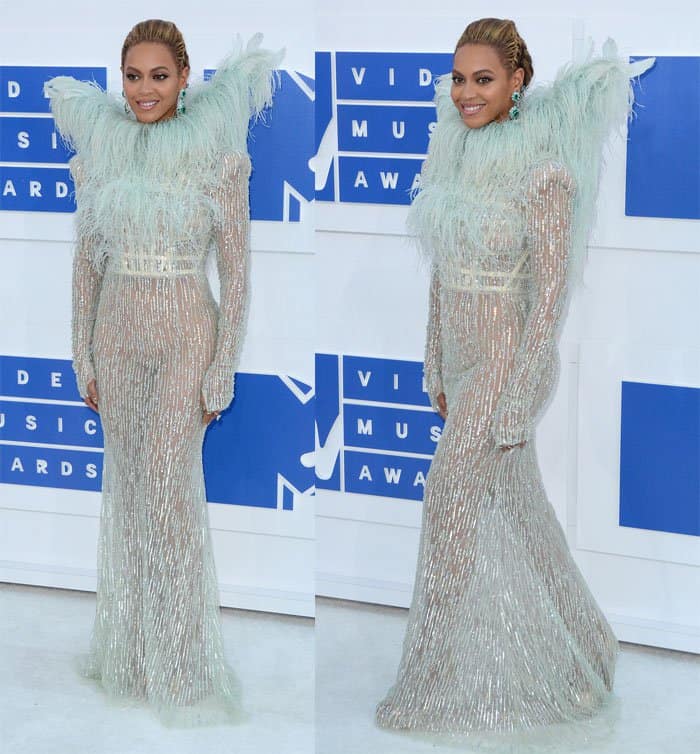 Beyonce's dress featured padded and exaggerated feathered shoulders and was elegantly lined with a nude bodysuit for coverage