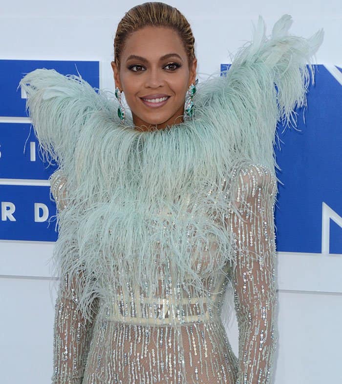 Beyonce in a mint-colored, floor-length, sheer sequin dress at the 2016 MTV Video Music Awards