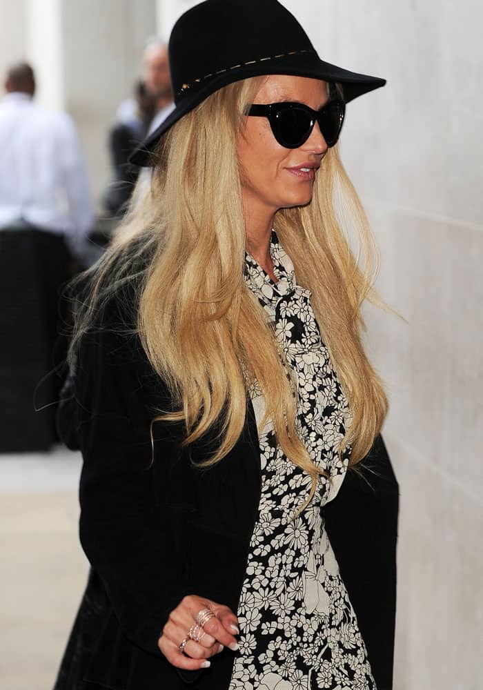 Britney Spears Spears in a black coat outside BBC Radio 1 in London