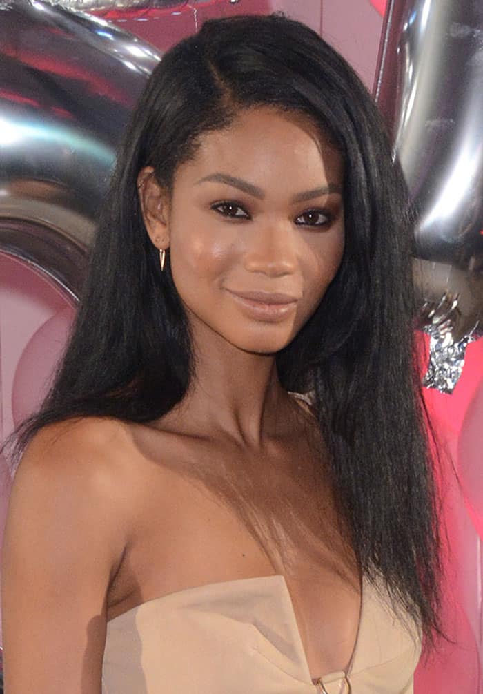 Chanel Iman wore her lustrous dark tresses down, parted on the side, perfectly complementing her ensemble