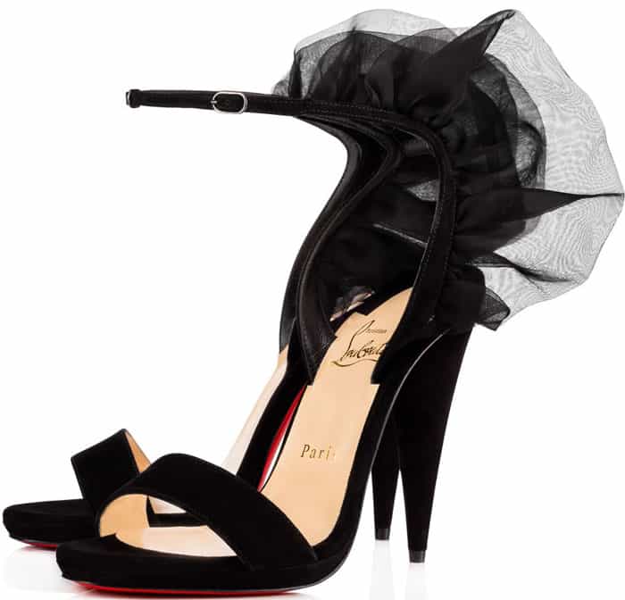 Crafted from a luxurious combination of suede and patent leather, they're decorated with frothy silk-organza ruffles that billow from the heel.