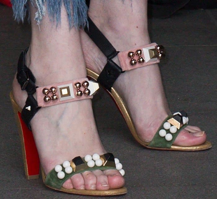 Eleanor Tomlinson shows off her feet in quirky studded Christian Louboutin "Pyrabubble" sandals