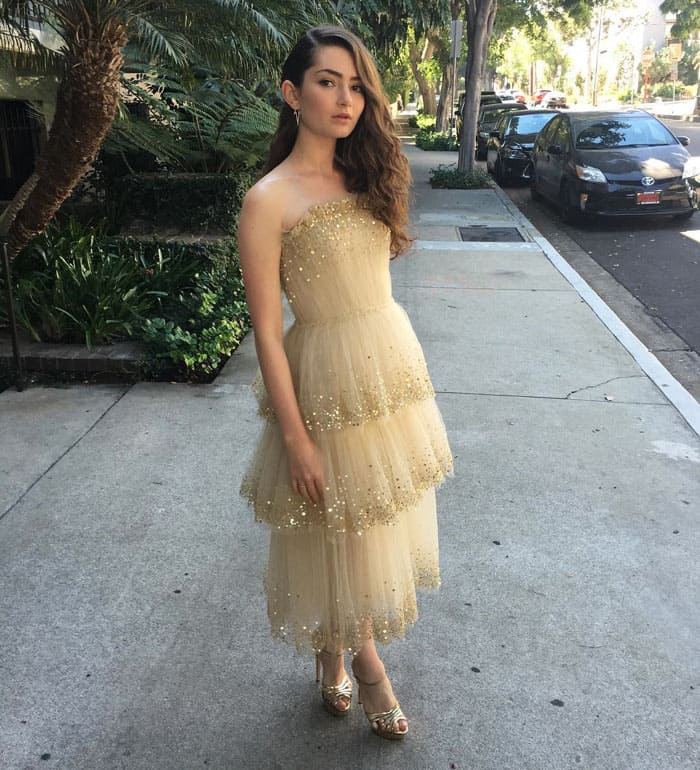 Emily Robinson's stylist uploads a photo of her with the caption, "One to watch / Emily Robinson #Emmys"