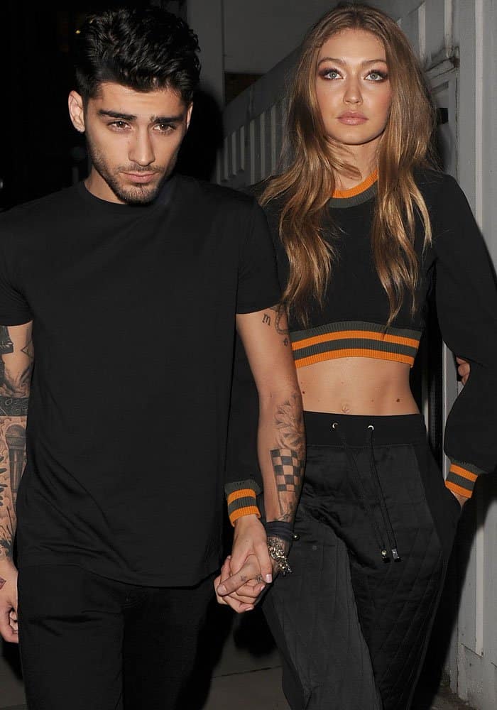 Gigi was photographed leaving the Versus Versace show hand-in-hand with boyfriend Zayn Malik