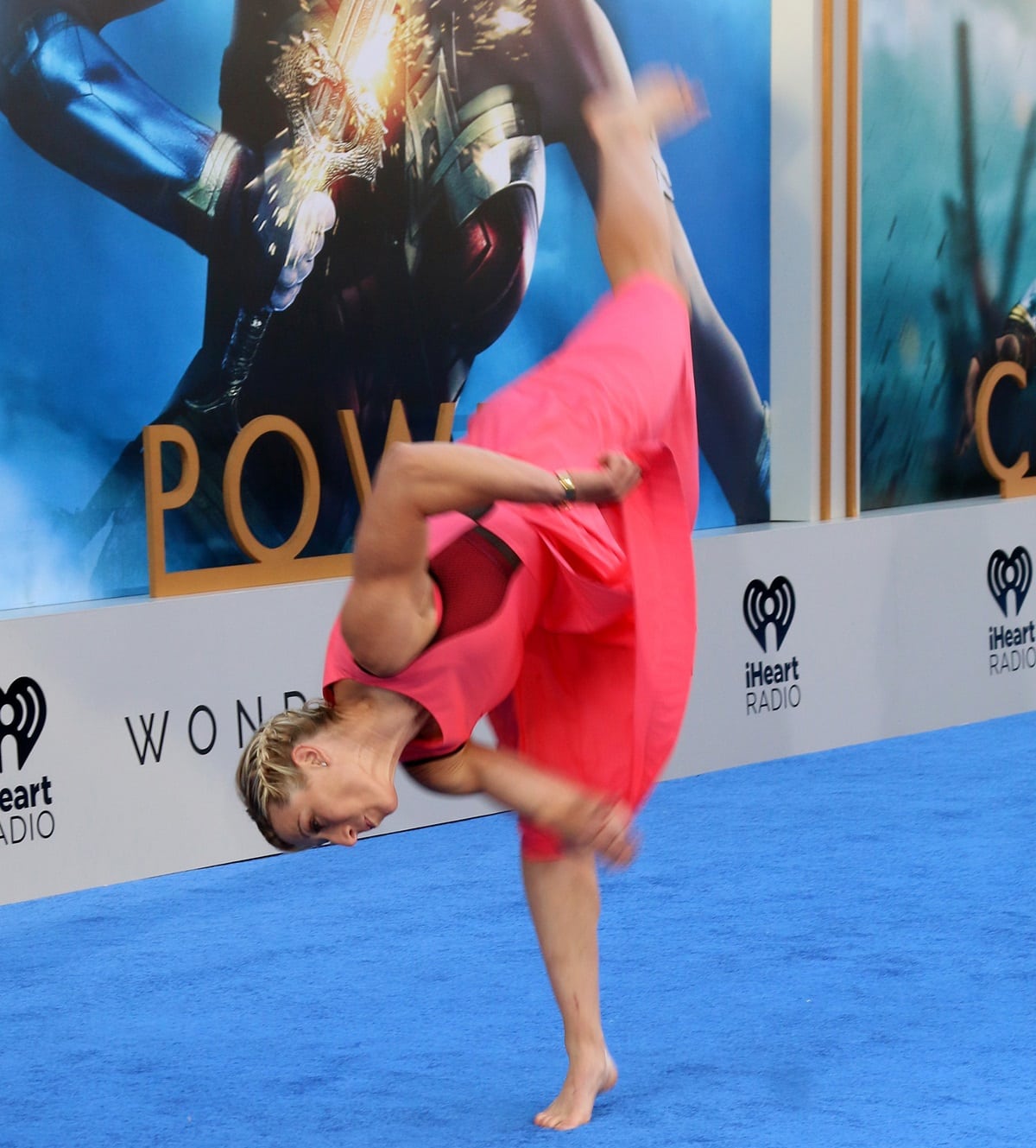 Jessie Graff appeared in a striking pink dress and showed off her acrobatic skills at the premiere of Wonder Woman