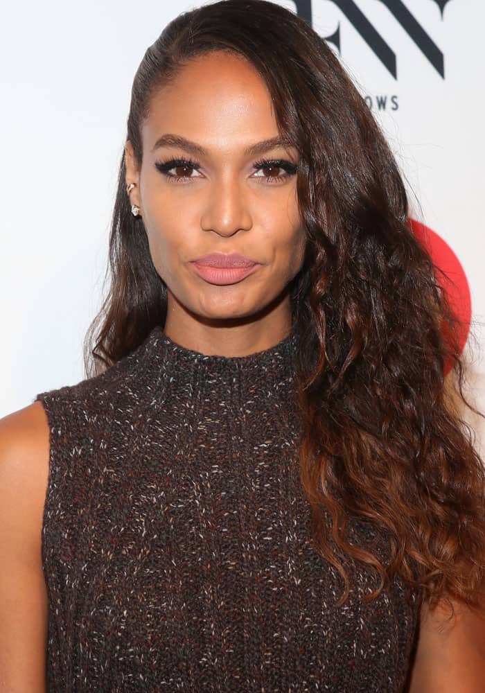 Joan Smalls donning a sleeveless knit turtleneck top at the Target and IMG kickoff for the New York Fashion Week