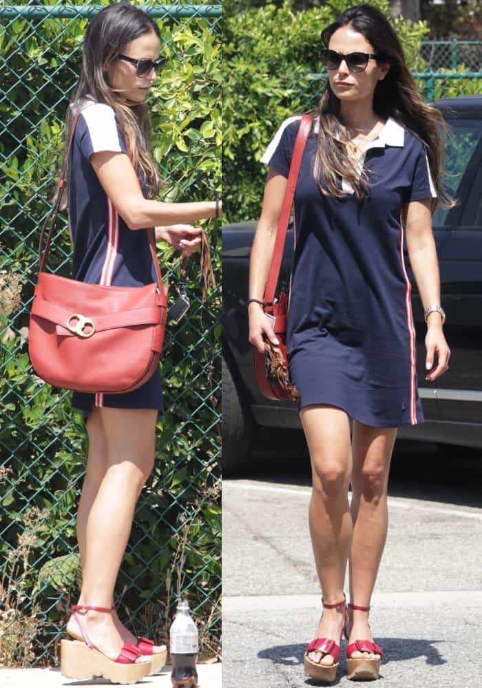 Jordana Brewster carried a red Tory Burch "Gemini Link" bag and showed off her post-baby body in a Tory Sport dress