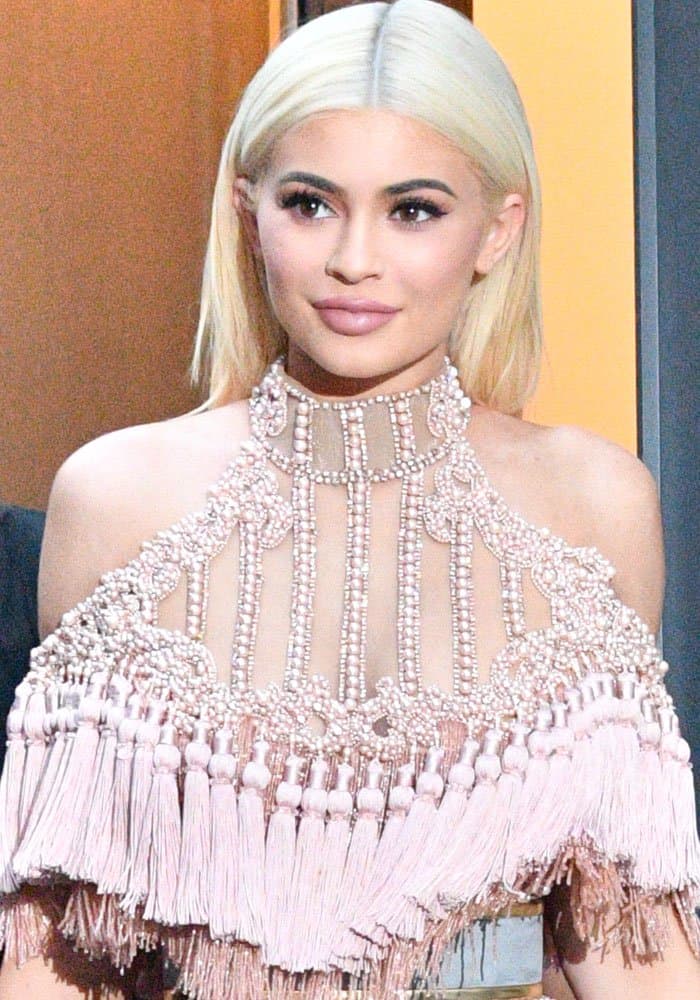 Kylie Jenner wears a Balmain embellished tulle dress with tassels