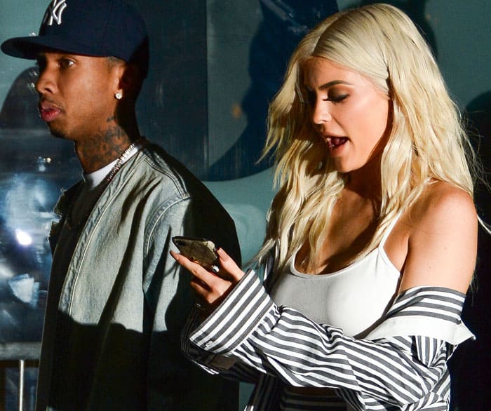 Kylie Jenner leaves the Kendall + Kylie launch with her boyfriend Tyga