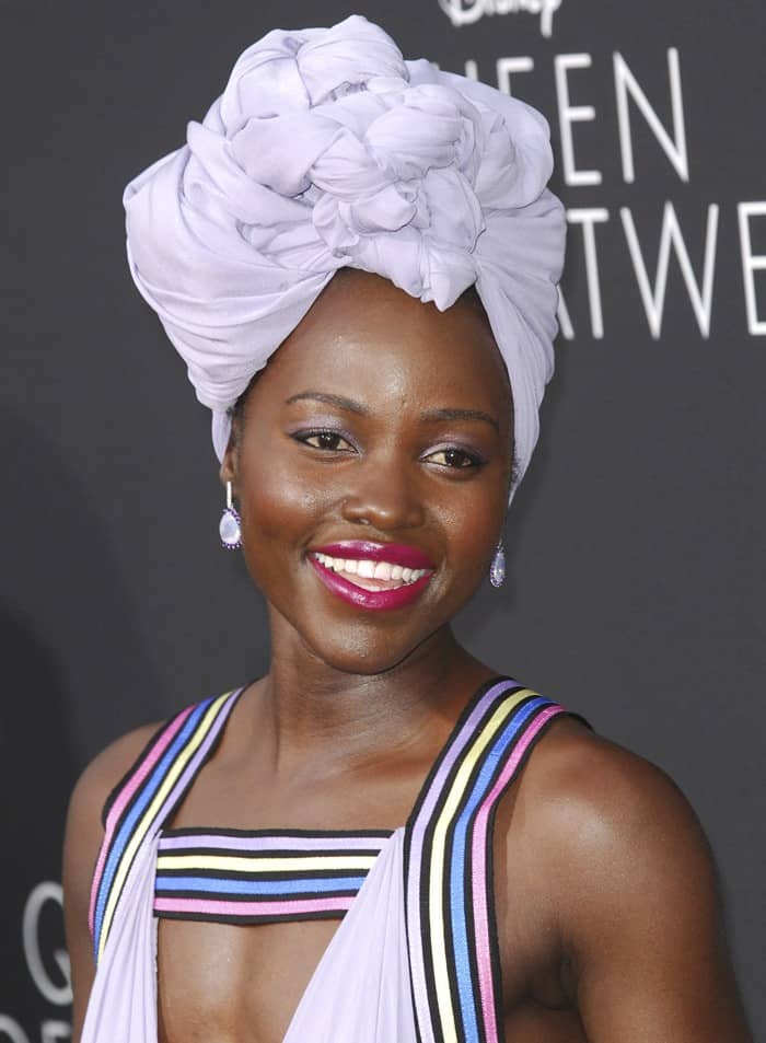 Lupita Nyong'o adorned a color-coordinated headdress, maintaining her impressive streak of showcasing beautifully wrapped headpieces