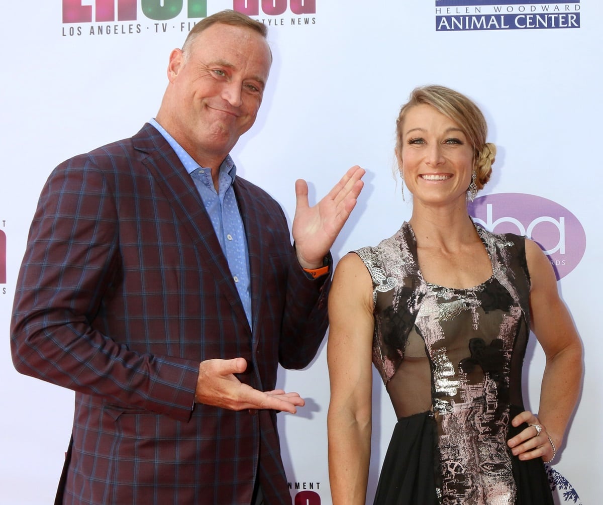 Jessie Graff turned heads in a sleeveless black and metallic embroidered gown with sheer paneling, standing alongside Matt Iseman at the Daytime Beauty Awards