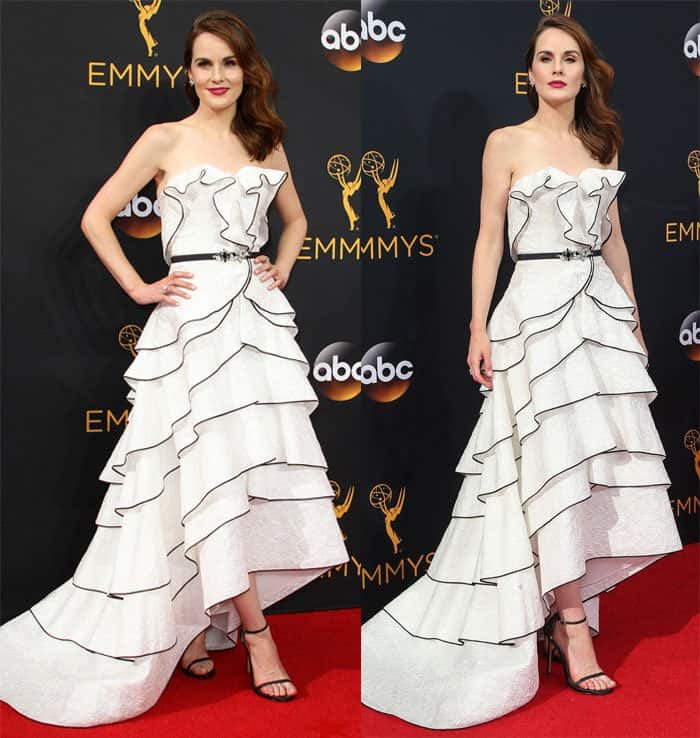 Michelle Dockery exudes elegance in a tiered Oscar de la Renta gown with black piping details and an asymmetrical hemline at the 2016 Primetime Emmy Awards