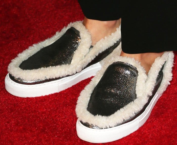 Michelle Rodriguez wears a pair of MM6 Maison Margiela shearling flats