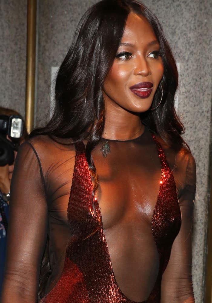 Naomi Campbell flaunts her boobs at the New York Fashion Week menswear presentation for Tom Ford