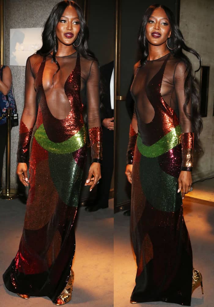 Naomi Campbell shows off her toned body in a revealing Tom Ford dress