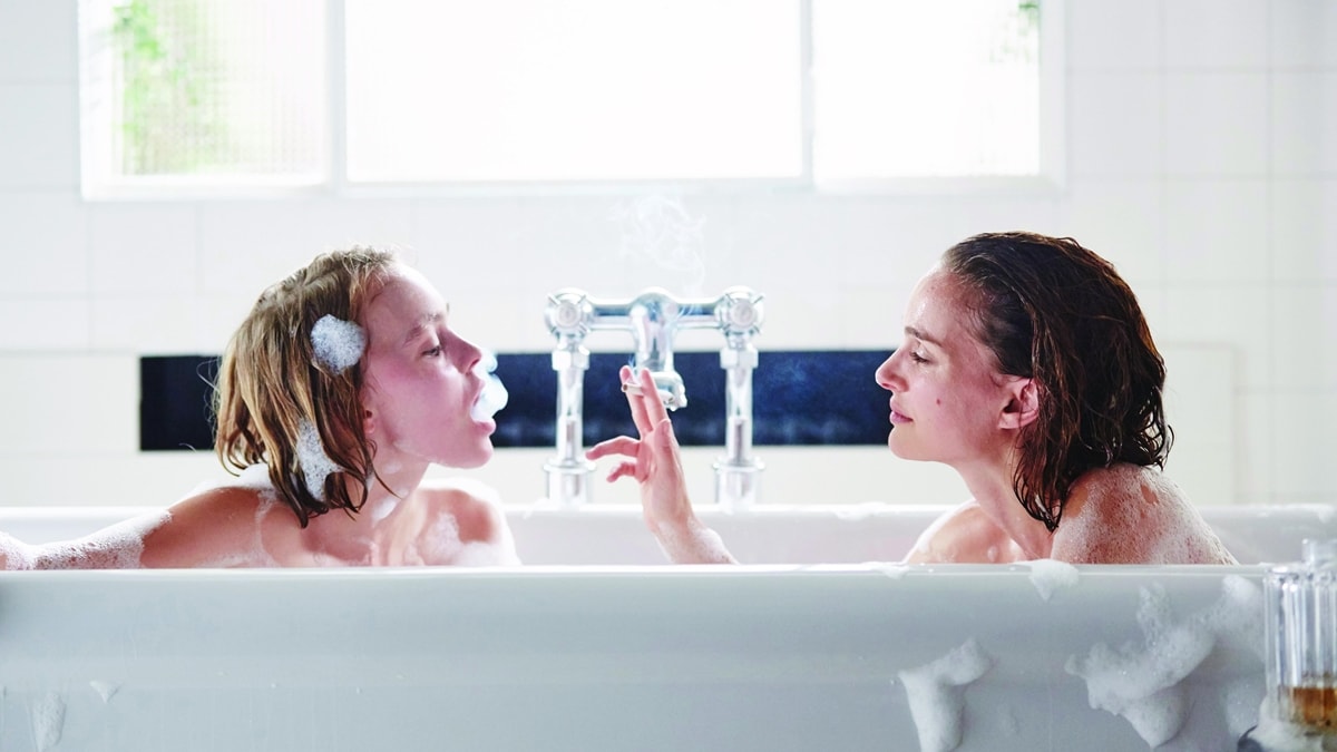 Natalie Portman as Laura Barlow and Lily-Rose Depp as Kate Barlow in the French-Belgian drama film Planetarium