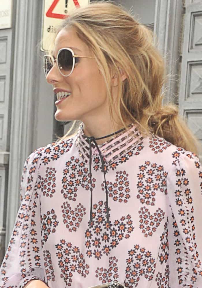Olivia Palermo was dressed to impress in a delicate pink silk floral pleated dress by Giamba