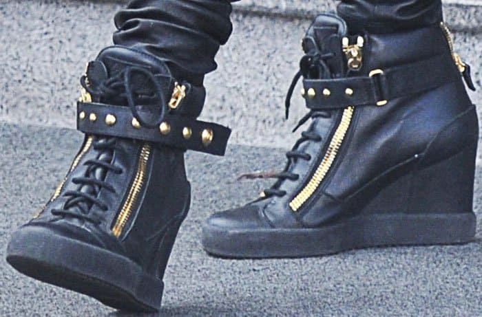 Paris shops around Milan in the Giuseppe Zanotti "Lorenz" wedge sneakers