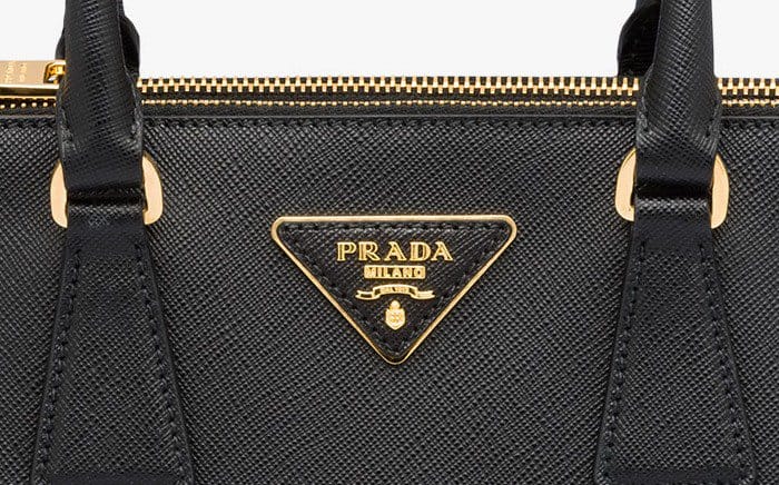 Prada's logo includes an inverted triangle