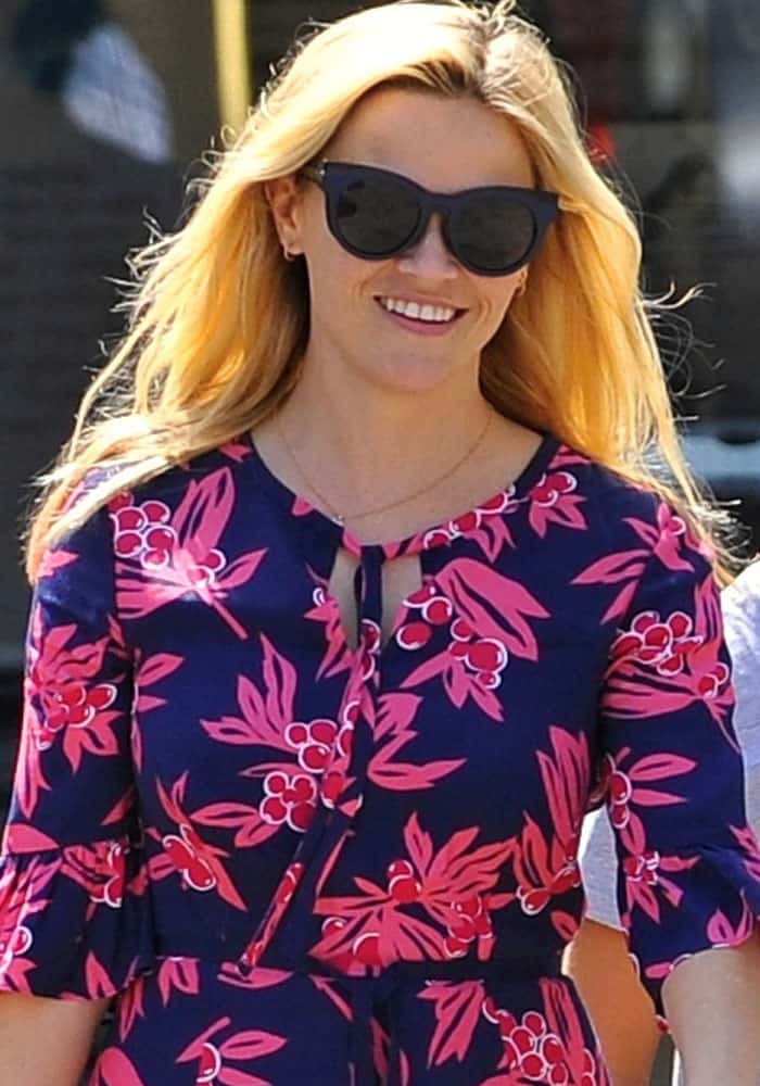Reese Witherspoon wears her blonde hair down as she attends church with her family