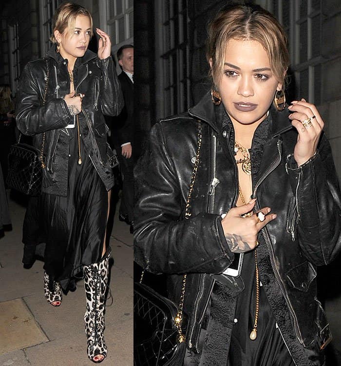 Gold accessories, including earrings, rings, and layered necklaces, added a touch of sophistication to Rita Ora's ensemble