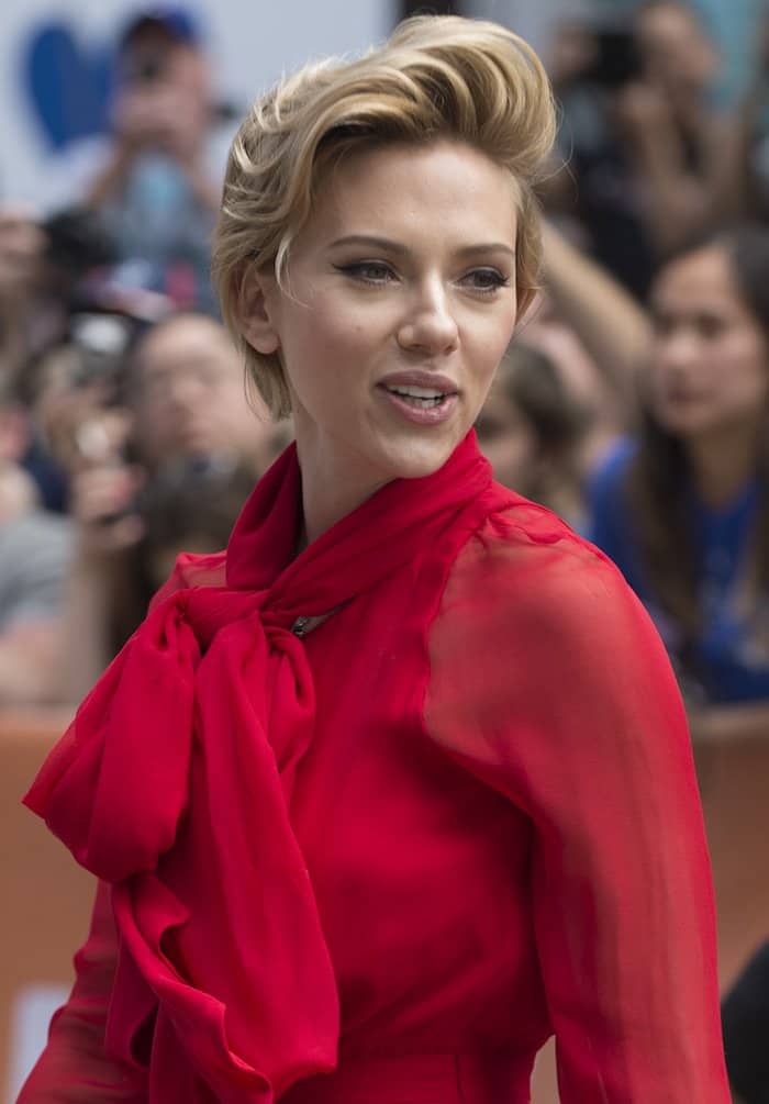 Scarlett Johansson radiated enthusiasm at the Toronto International Film Festival premiere of her animated musical Sing