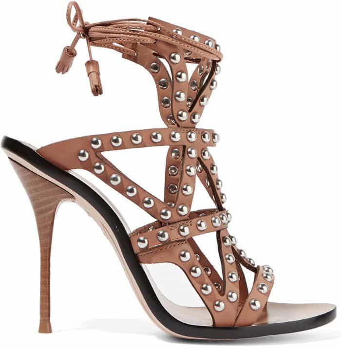 Crafted from tan leather, these 'Mila' sandals have a cage silhouette that's covered in polished silver studs