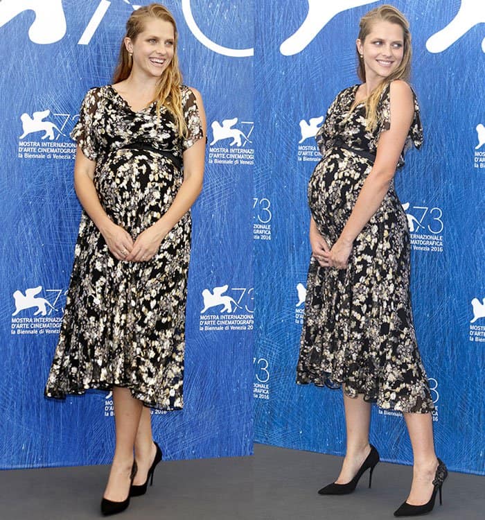 Teresa Palmer showcases her growing baby bump in a floral Valentino Fall 2016 dress