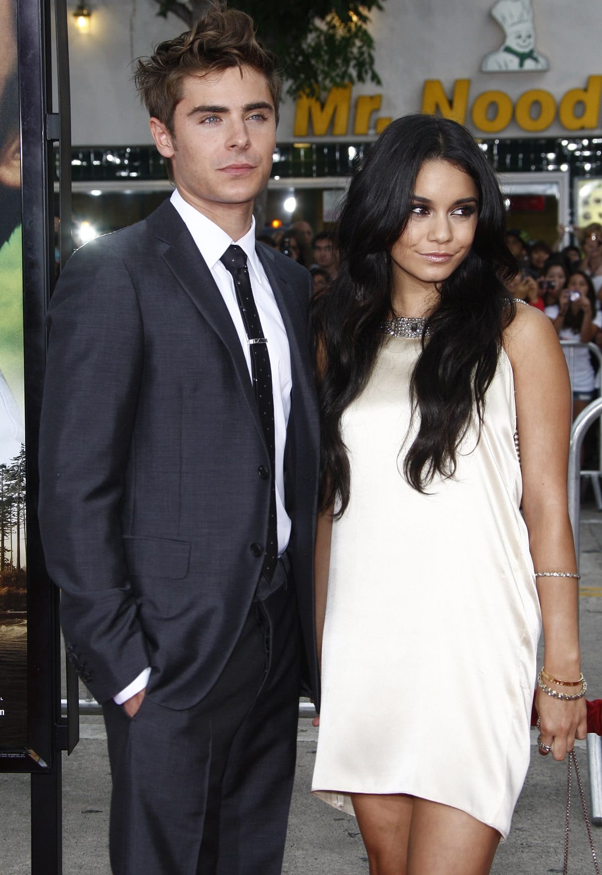 At the premiere of Charlie St. Cloud, Vanessa Hudgens stunned in a chic ivory mini dress while Zac Efron kept it classic in a sharp gray suit
