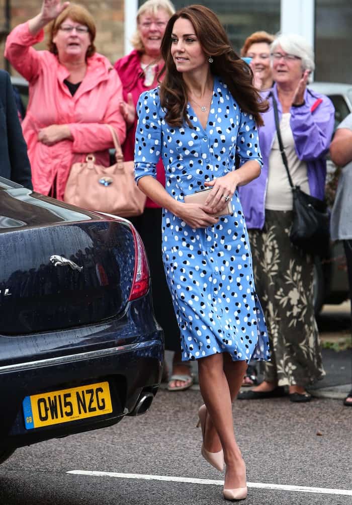 Kate Middleton radiantly donned a vibrant blue dress from Altuzarra’s Pre-Fall collection, juxtaposed with classic nude pumps