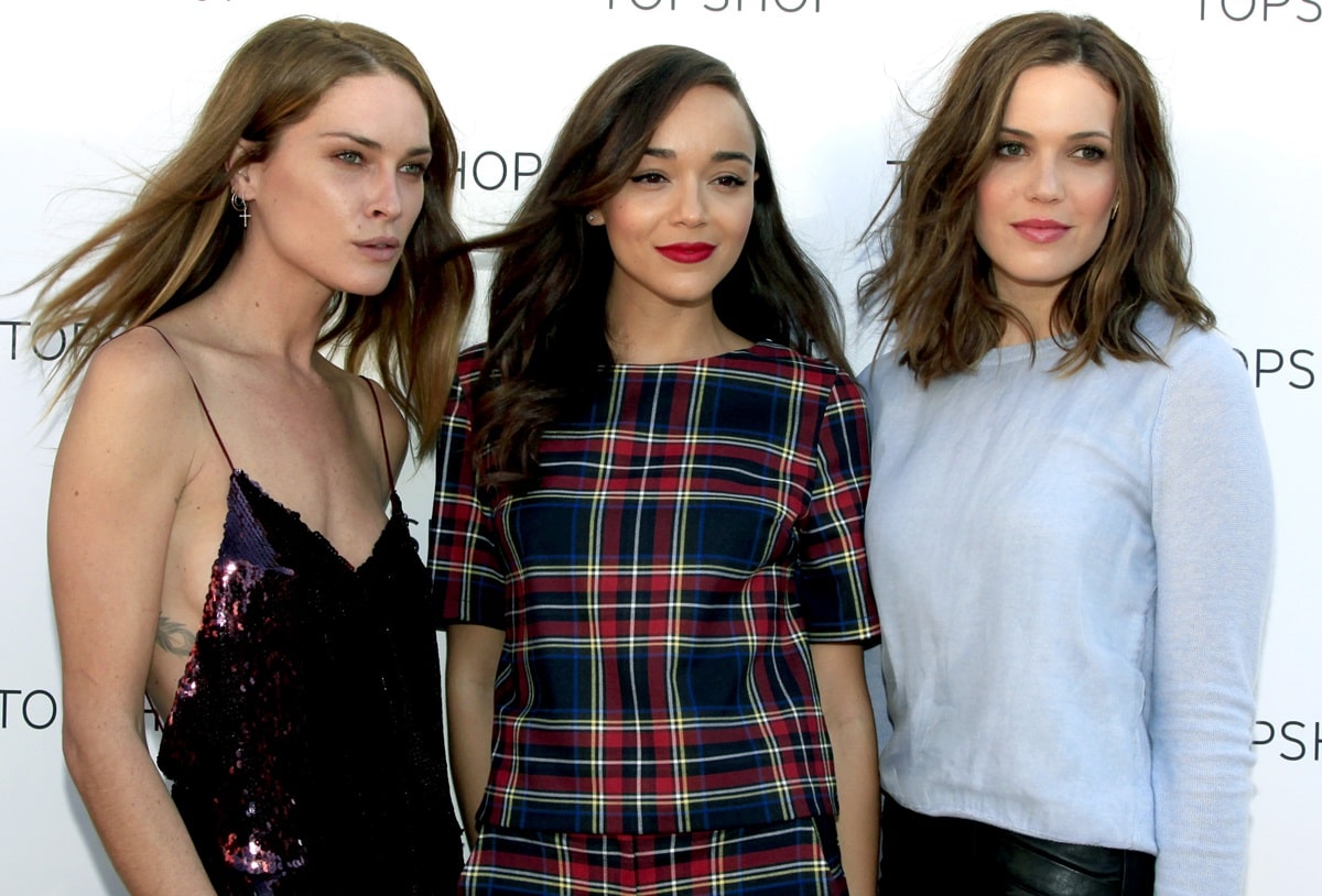 Ashley Madekwe, standing at 5 feet 7 inches (170.2 cm), appears slightly shorter than Mandy Moore at 5 feet 9 ¾ inches (177.2 cm) and Erin Wasson, the tallest of the trio, at 5 feet 10 inches (177.8 cm)