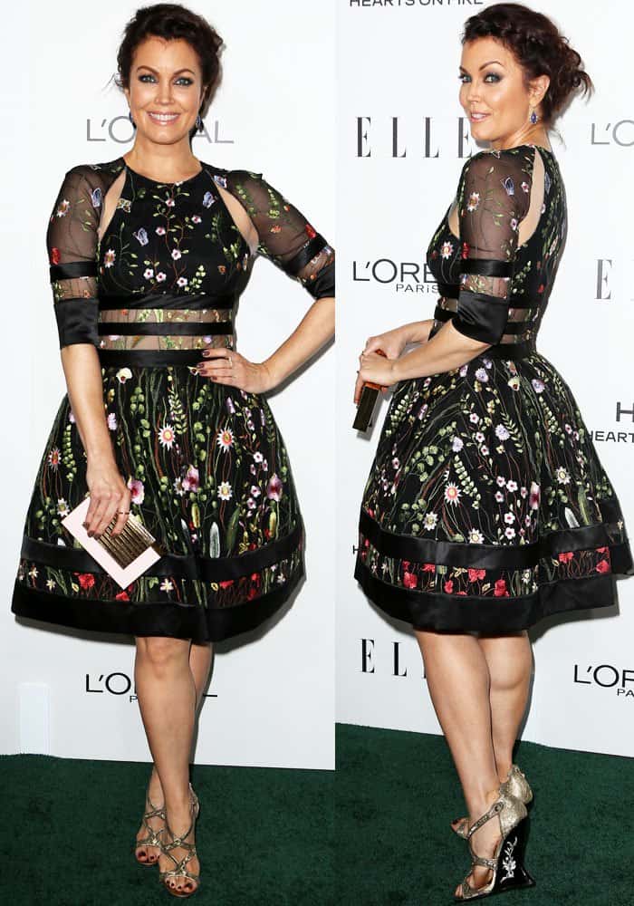The beautiful Bellamy Young looks a tad bit frumpy in a dress by the British brand Couturissimo