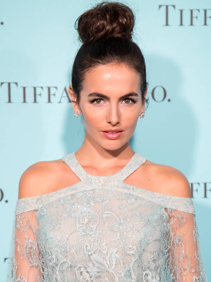 Camilla Belle adorned herself with exquisite diamond and aquamarine jewelry at the unveiling of the newly renovated Tiffany and Co. Beverly Hills store