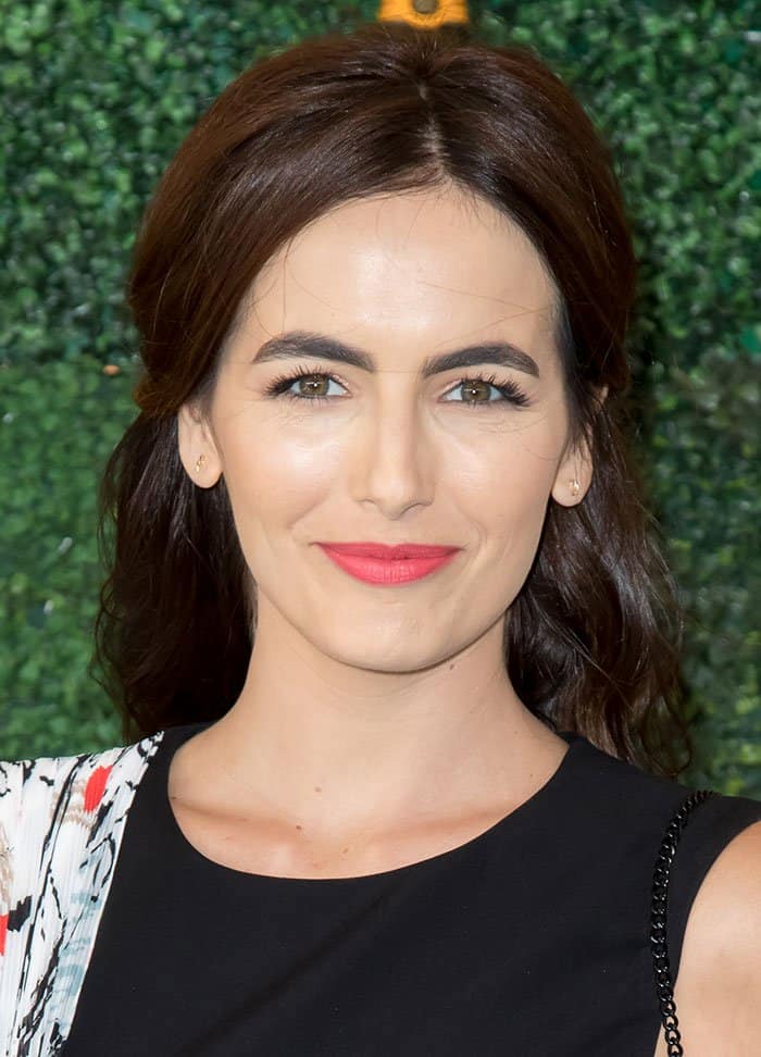 Camilla Belle's beauty was equally captivating, as she wore her hair down in soft, flowing waves and sported a flawless makeup look, complete with a lovely shade of pink lipstick and well-defined brows