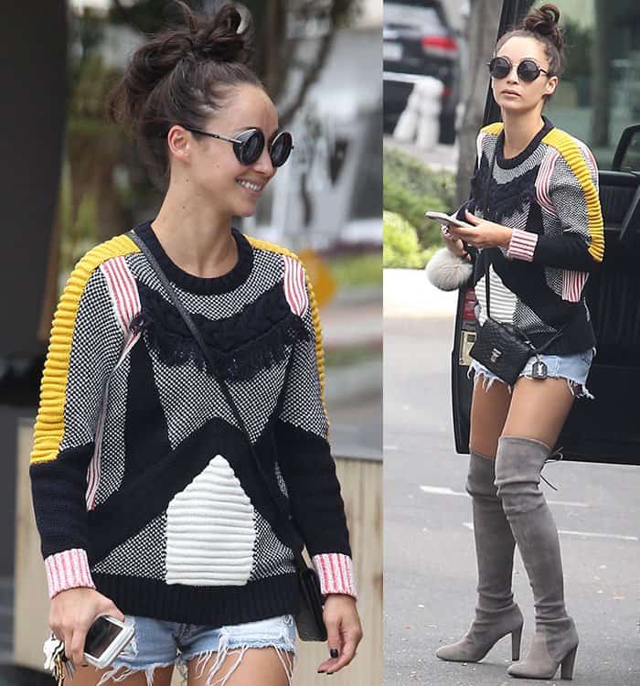 Cara Santana showcases a striking ensemble featuring a vibrant, multicolored knit sweater paired with sleek, daring thigh-high boots to grab coffee at Alfred Coffee in West Hollywood