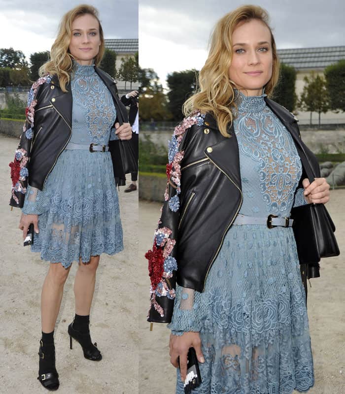 Diane Kruger wears an embellished leather jacket with a lace mini dress outside the Elie Saab show