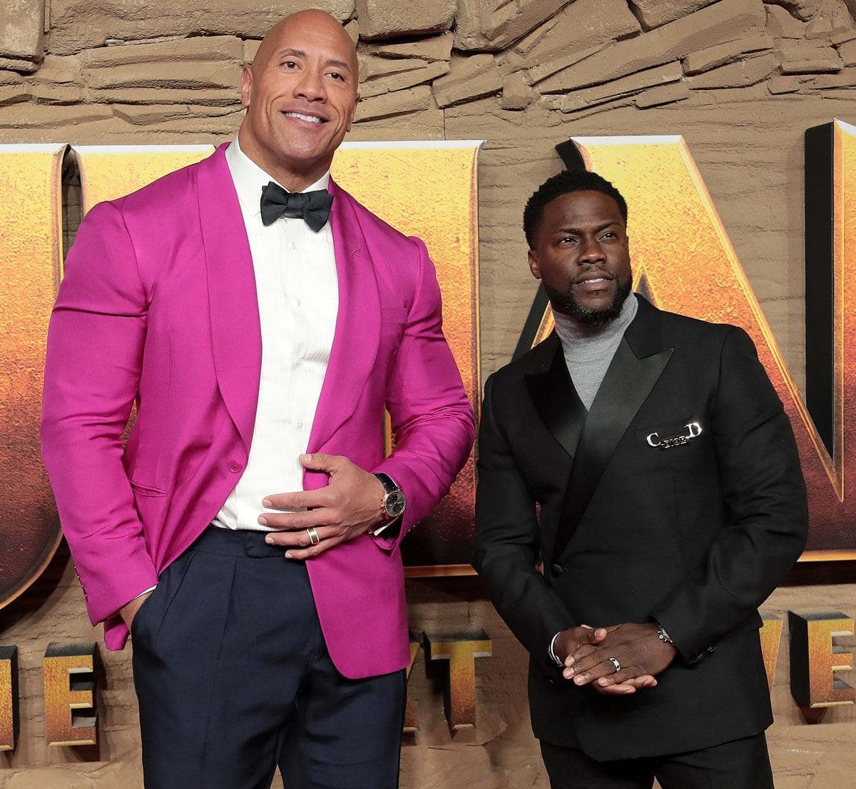Dwayne Johnson is 6′ 5″ (196 cm) and towers over and Kevin Hart who is 5’2 ½ (158.8 cm)