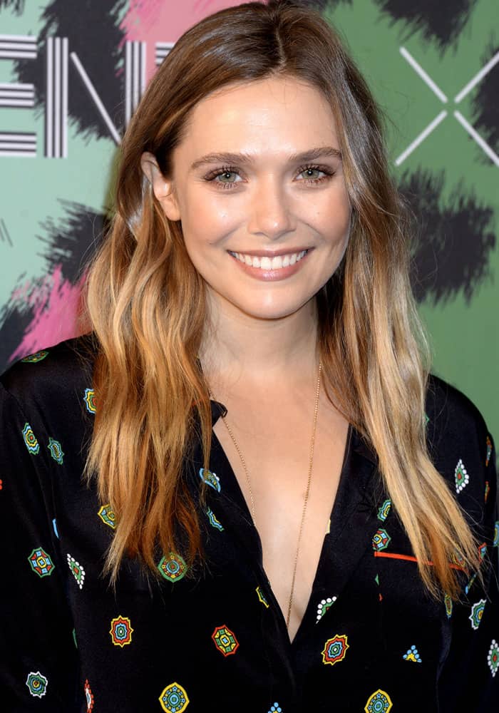 Elizabeth Olsen's appearance at the Kenzo x H&M collection launch in New York unmistakably underscores that style is an inherent trait in the Olsen family