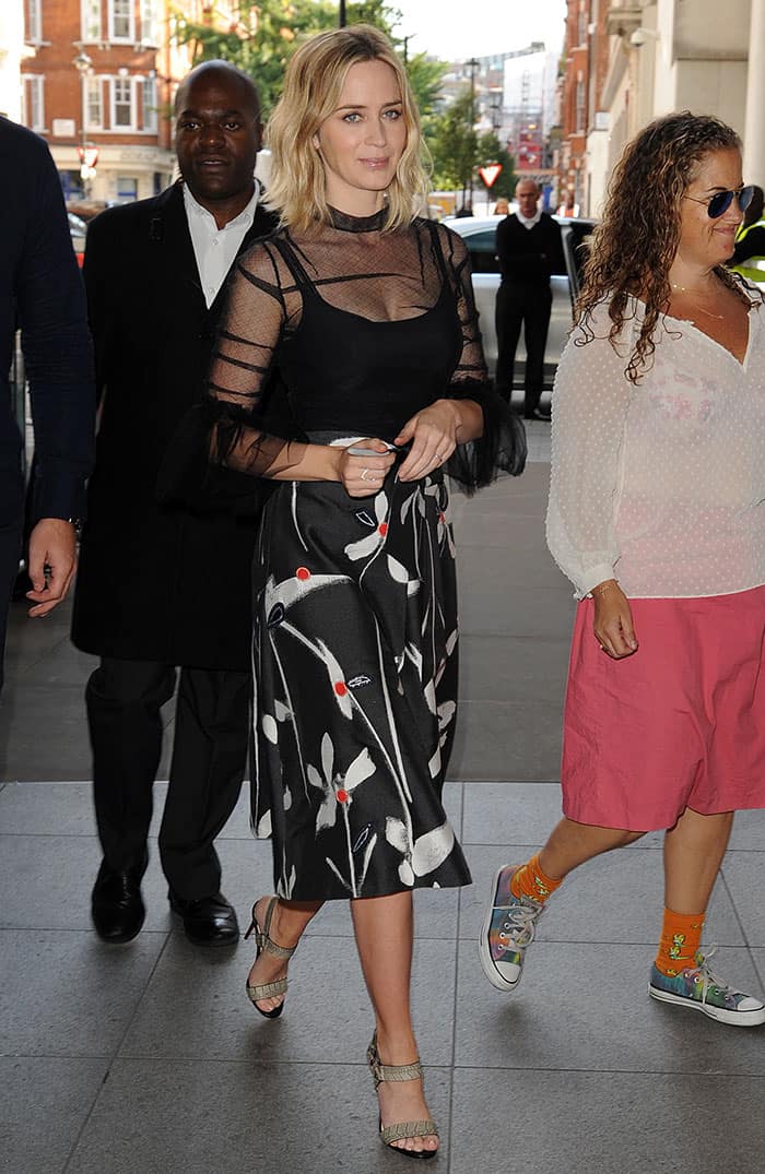 Emily Blunt wearing a floral-patterned midi skirt by Sachin & Babi