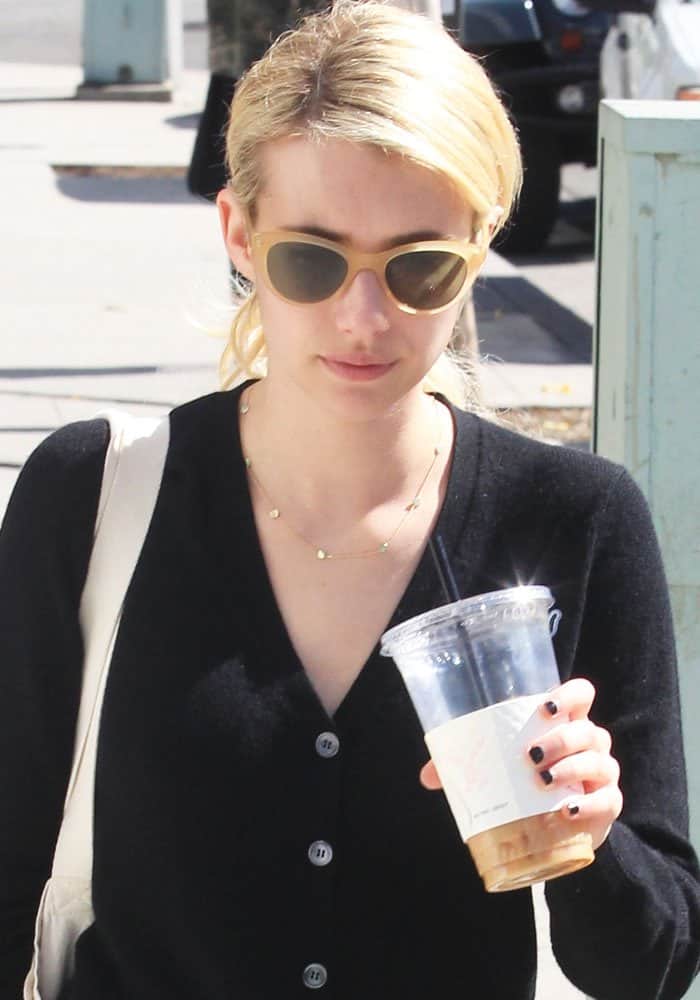 Emma Roberts stylishly dons Garrett Leight x Clare V. sunglasses while grabbing coffee in Beverly Hills