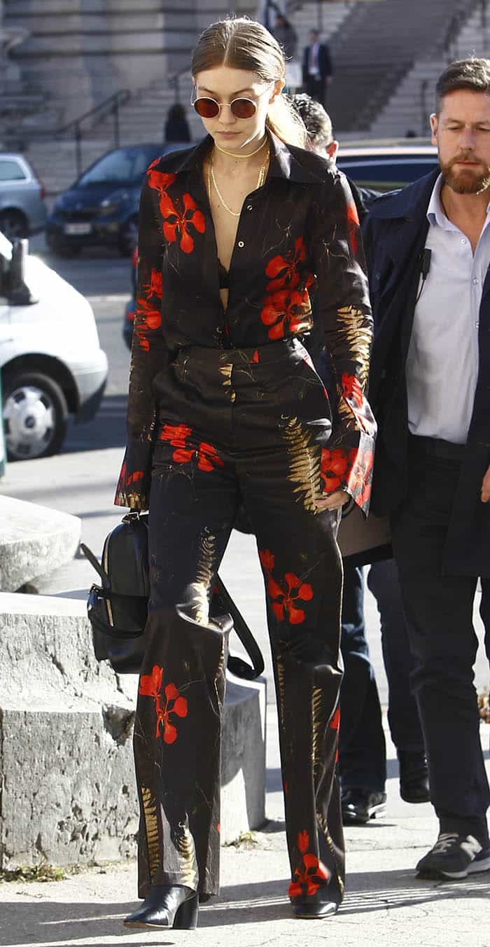 Gigi Hadid makes a bold fashion statement in a black floral-print ensemble at Paris Fashion Week