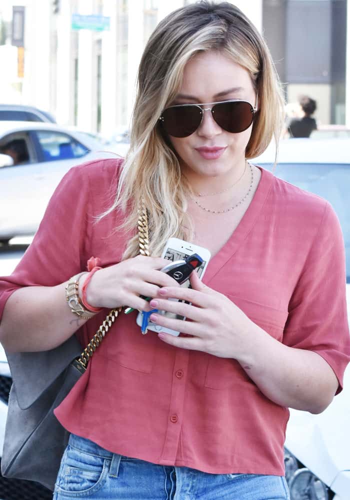 Hilary Duff was spotted on a lunch date with her new beau, Jason Walsh, just before picking up her son Luca in Los Angeles