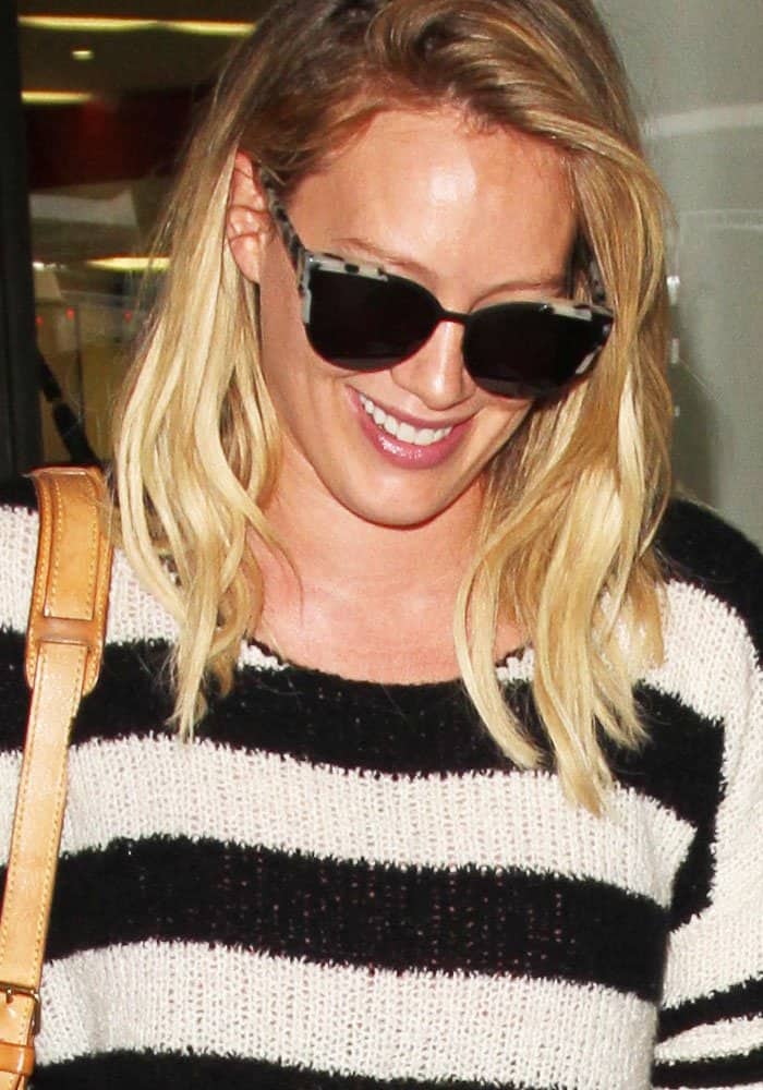 Hilary Duff added a touch of glamour to her ensemble with Christian Dior's "Wildly" sunglasses in Los Angeles