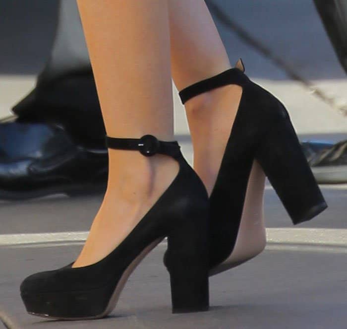 Isla Fisher rocks Gianvito Rossi pumps with adjustable ankle straps, almond toes, 1.3-inch platforms, and 4.5-inch block heels