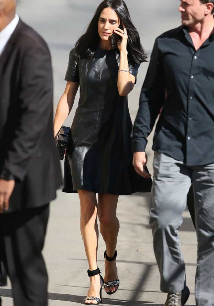 Jennifer arrived in a leather Louis Vuitton dress earlier that day