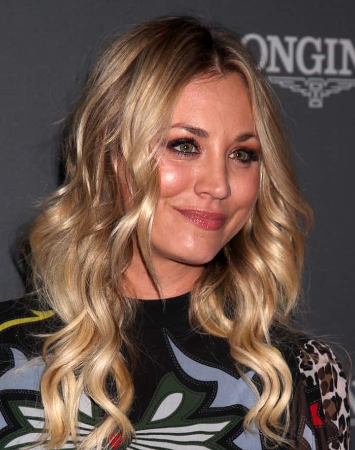 Kaley Cuoco's multicolor georgette dress features long sleeves and a floor-grazing pleated skirt